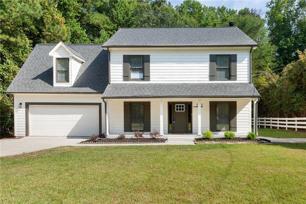Tucked away on a quiet street in the Hillgrove High School District, this newly renovated traditional home offers the perfect mix of space, comfort, and charm for the whole family. The heart of the home is the bright eat-in kitchen with oak cabinets and stainless steel appliances, opening to a cozy fireside living room where everyone can gather. Upstairs, the spacious master suite is a true retreat, featuring his-and-hers closets, a flexible bonus room that works beautifully as a playroom, home office, or workout space, and a private bath with double quartz vanities and floor-to-ceiling tile. Three additional bedrooms share a convenient hall bathroom, giving everyone their own space. The oversized backyard is perfect for kids to play, pets to roam, and family cookouts on the large deck. Surrounded by privacy and quiet, it’s a wonderful place to come home to at the end of the day. This welcoming home offers everything a family needs—room to grow, modern updates, and a peaceful setting in sought-after Cobb County.