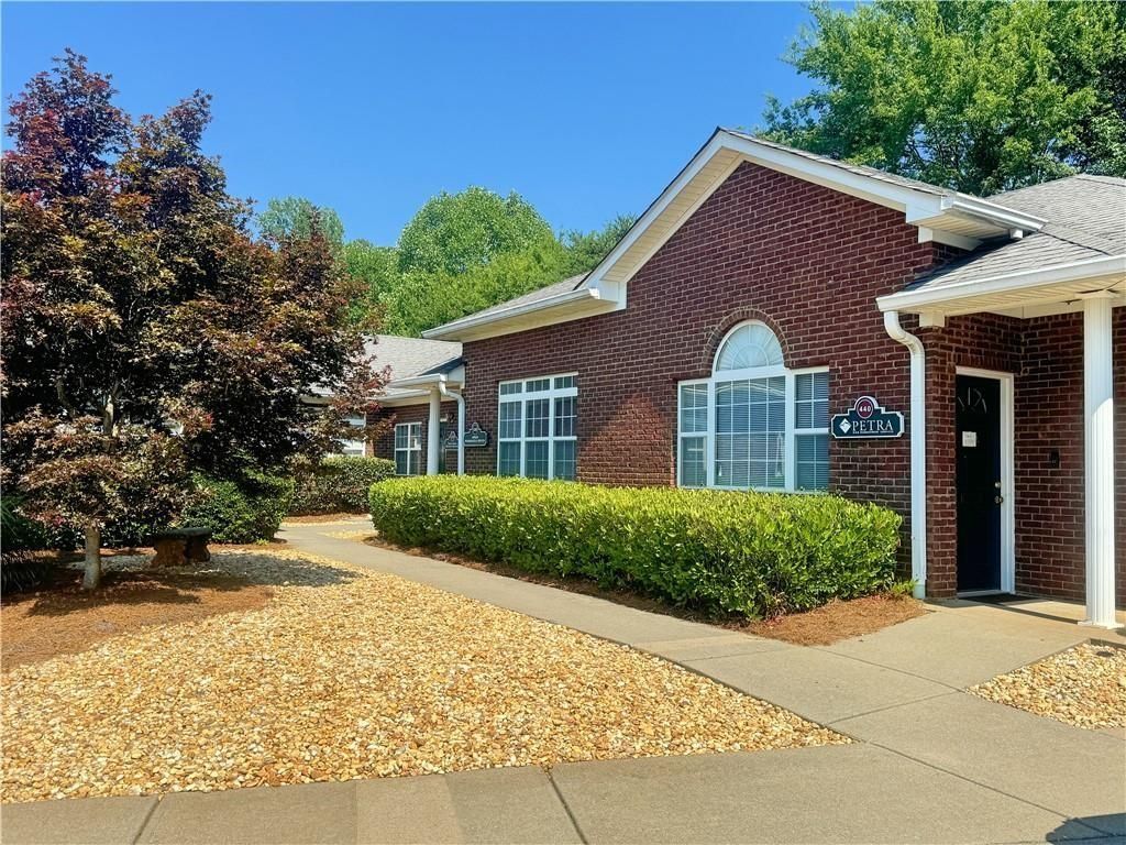 Photo of 1005 Weatherstone Parkway #220, Woodstock, GA 30188 (MLS # 7704028)