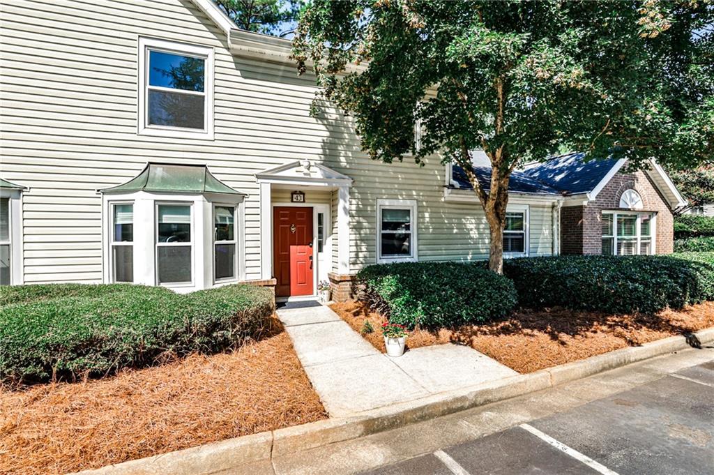 Life at The Condominium of Avondale Estates is about lifestyle and easy living! It offers the best of everything: a strong sense of community; low maintenance ownership; an outstanding HOA; a private pool where community events are held, like the July 4 BBQ; two private tennis courts for staying active with tennis or pickleball; meandering sidewalks to offer easy access to other Avondale assets like Avondale Lake, the Town Green, Tudor Village, parks, schools, retail shopping and dining.
This light-filled, move-in ready townhome-style condo offers both space and location in the community’s largest floor plan! Vinyl plank floors throughout the main level make for easy maintenance. The flow makes entertaining easy! There’s also a bonus room, ideal for a home office, exercise, music, you name it! The oversized living room has a fireplace, is equipped with a wet bar, and direct access to the outdoor patio. Replacement windows throughout provide energy savings and allow the sun to fill each room with natural light! Upstairs is your retreat space--an oversized primary bedroom with two walk-in closets and an en-suite bath; two secondary bedrooms; an additional full bath; and a spacious laundry room. With 2,350 square feet, this townhome lives like a single-family home! All this in an active community setting make this condo and its location so desirable.
Welcome home to good living! You're going to love this Avondale condo community and all it offers.