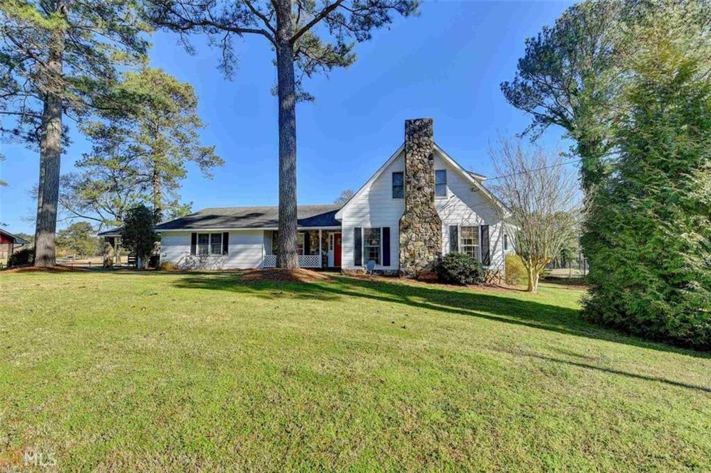 Enjoy peaceful views and premium living in this spacious 3-bedroom, 2-bathroom home that backs directly onto a scenic golf course. The oversized master suite features a luxurious master bathroom with a separate shower, a relaxing soaker tub, and dual walk-in closets for him and her. A bright and airy sunroom offers the perfect spot to unwind, while the large family room with a cozy gas stone fireplace provides a warm gathering space. Additional highlights include a dedicated workshop, extra workspace, and plenty of room to entertain or relax. Don't miss this rare opportunity for comfort, space, and location!