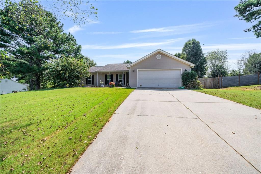 Welcome to 443 Robins Way in the sought-after Robinhood Estates Community of Auburn, GA!
Built in 2004 and nestled on a fantastic half-acre lot, this charming ranch-style home offers the perfect blend of comfort, space, and convenience. Step inside to a bright and inviting open floor plan designed for east living. The layout features 3 bedrooms and 2 full baths, providing plenty of room for family, guests, or a home office. The main living flows seamlessly, creating a warm and welcoming atmosphere from the moment you walk in.
Enjoy a private backyard retreat, ideal for entertaining, relaxing, or simply soaking up the peace and quiet of your surroundings. Whether you're hosting gatherings or enjoying quiet evenings at home, this property has the space to make it your own. With its prime location, generous lot size and timeless design, this home truly has it all. Don't miss your chance to make this Auburn gem yours- schedule your private tour today!