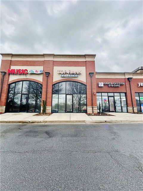 Photo of 10475 Medlock Bridge Road #103, Duluth, GA 30097 (MLS # 7712214)