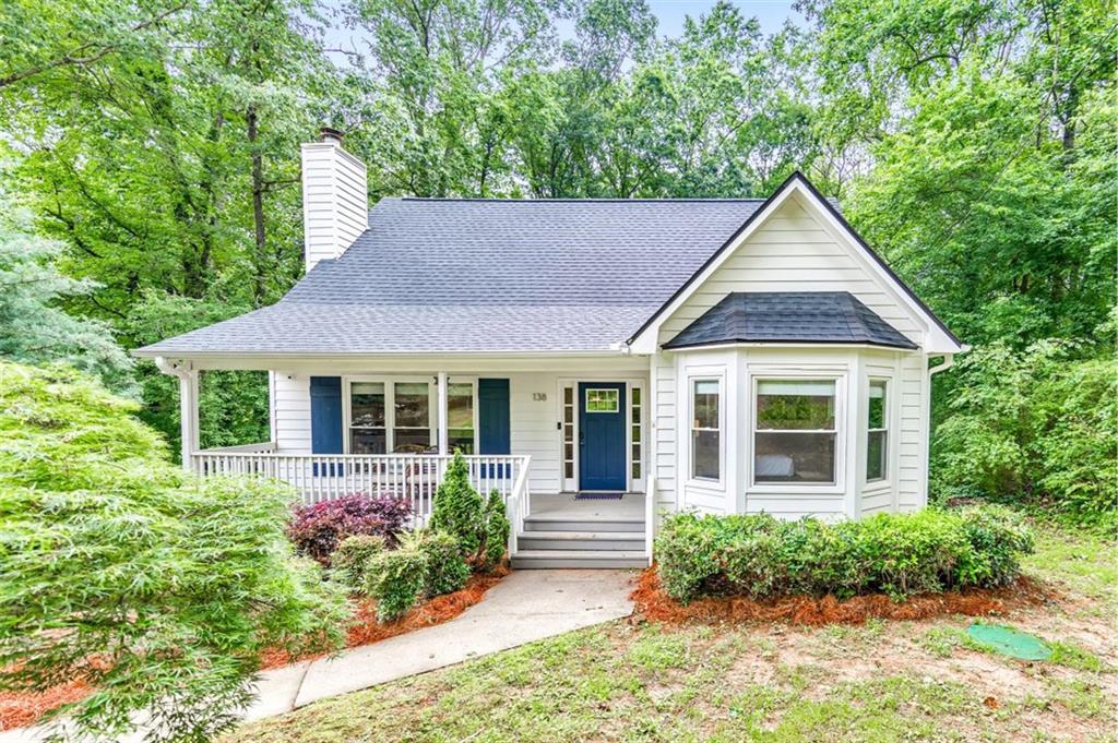Charming design meets modern convenience in this beautifully renovated 3 bed / 2.5 bath cottage-style home in a prime Woodstock location, just minutes from highways, shopping, and dining. This property has been an income-producing Airbnb since 2019 with a strong rental history, making it turn-key for both investors and homeowners. Offered at $470K all-inclusive—furniture, silverware, bath towels, and more—this home is ready to start earning you money on day one. A welcoming front porch opens to a fireside living room with built-in bookshelves and a stunning kitchen featuring white cabinetry, stainless steel appliances, an island, and dining area. The main-level primary suite includes a large walk-in closet and spa-like bath with soaking tub, separate shower, and a quartz double vanity. Upstairs, two spacious bedrooms share an updated bathroom with a quartz vanity. The finished basement offers a versatile bonus room, perfect for a home office, media space, or playroom. Enjoy outdoor living on the back deck overlooking a private, wooded backyard. Located in the desirable Woodstock High School district with no HOA, this home offers charm, flexibility, and immediate investment potential. Don’t miss this opportunity!