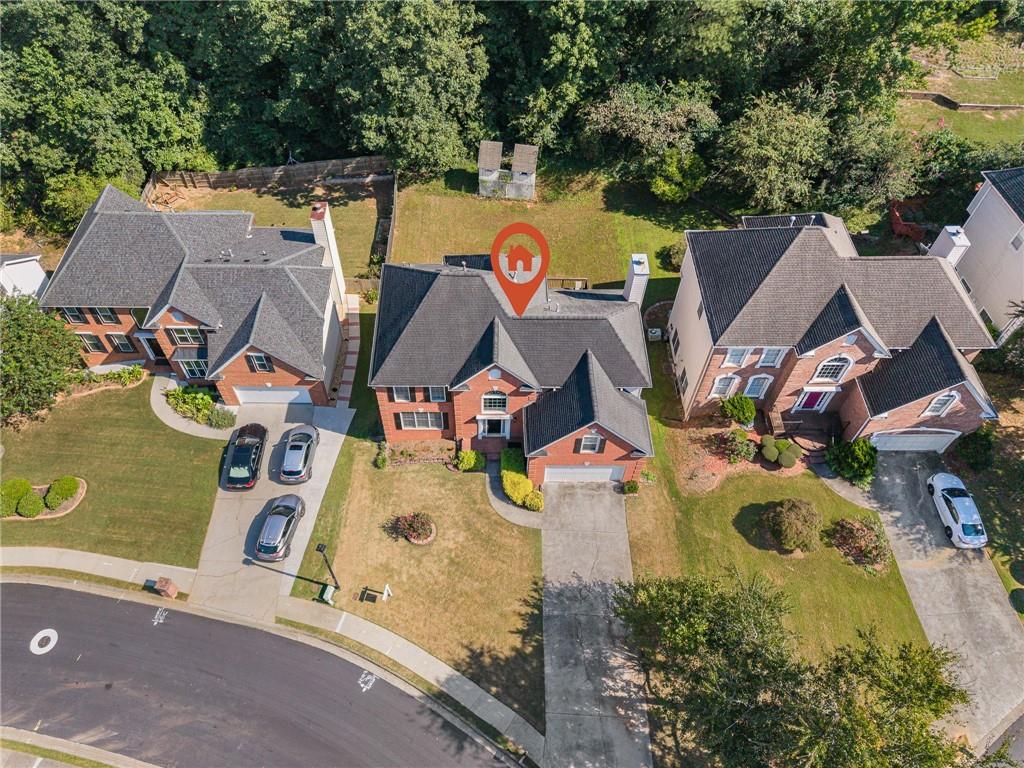 Welcome to this stunning brick-front home featuring 5 bedrooms, 3.5 bathrooms, and a full finished walkout basement. The terrace level offers a versatile guest or in-law suite with a full bath, plus a bonus room ideal for a home gym, media room, or game area.
The main level boasts a gourmet kitchen with a breakfast area, an elegant 12+ seating dining room, a formal living room, and a spacious family room with a cozy fireplace that opens to the deck—perfect for entertaining or relaxing while enjoying the private backyard. A convenient half bath is also located on the main floor for guests.
Step inside through the dramatic two-story foyer with beautiful wooden stairs leading to the upper level. Upstairs, you’ll find a luxurious owner’s suite and three additional generously sized bedrooms. The laundry room is centrally located for convenience, and a secondary staircase provides easy access to the family room.
Located in a welcoming community with sidewalks, underground utilities, and a small HOA, this home is just minutes from parks, restaurants, and shopping. Best of all, it’s in the highly sought-after Brookwood High School district.
Don’t miss your chance to own this incredible property—it won’t last long!