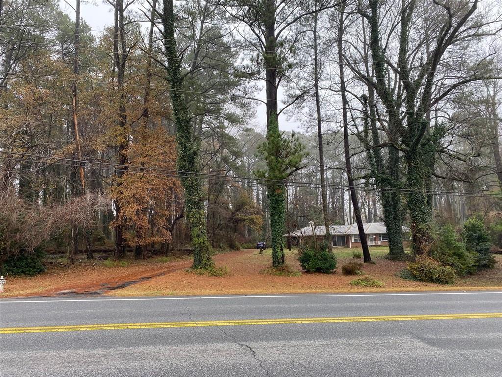 Potential Commercial acreage available in the heart of downtown Powder Springs.  This prime location offers approximately 6 acres with multiple development options.