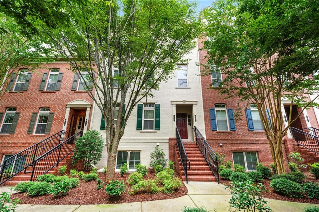 Perfectly positioned near GA-400 and I-285, this move-in ready home in Promenade at Northplace delivers the perfect blend of style, comfort, and convenience while offering unmatched access to City Springs, Perimeter Mall, MARTA, parks, dining, shopping, and entertainment. Every inch has been thoughtfully upgraded, from the quartz kitchen with premium cabinetry to the reconfigured primary bath with a sleek, modern design, and the fully renovated secondary bath. Luxury hardwood floors flow throughout, accented by crown molding, designer lighting, and on trend neutral paint. Comfort comes easy with a brand-new HVAC system. Enjoy morning coffee on your private balcony, park with ease in your rear-entry garage, and take advantage of a community pool and green space just outside your door. With HOA dues covering exterior maintenance including the roof, gas, pest control, trash, and landscaping, weekends are yours to explore, relax, and enjoy everything the Perimeter lifestyle has to offer.