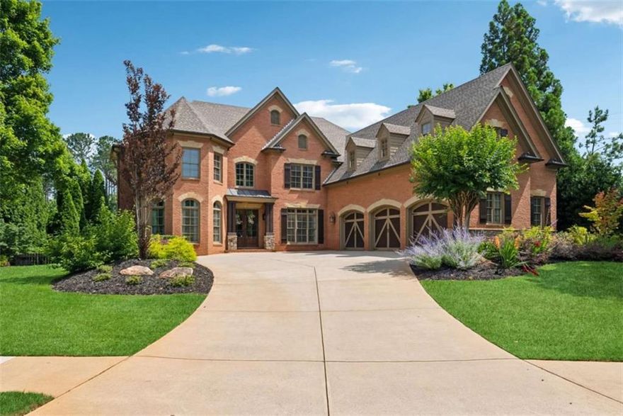 This spacious and beautifully designed home offers everything you need for comfortable living and easy entertaining-and with a quick close available, you can settle in just in time to enjoy summer by your own private pool. As you walk in, you're welcomed by a two-story foyer that opens to bright, open living spaces with hardwood floors throughout.    The main level features a large dining room with wainscoting, a home office, a powder room, and a private guest suite with its own full bathroom. The living room has coffered ceilings and a cozy fireplace. The oversized kitchen is perfect for anyone who loves to cook and gather, with a huge island, high-end appliances, a hidden walk-in pantry, and a fireside keeping room that adds extra comfort. A spacious mudroom off the 3-car garage offers plenty of storage and convenience.    Upstairs, the primary suite is a true retreat with a sitting area, a spa-like bathroom, and an oversized walk-in closet. You'll also find three additional bedrooms, each with its own private bathroom, a bonus room ideal for a playroom or game room, and a laundry room with a sink.    The finished basement is packed with possibilities and includes two living areas, a media room, a game room, a gym, a second office, a bedroom with a full bath, a kitchenette, and even a private salon.    Step outside to your own private backyard oasis. Enjoy a flat yard with a pool, hot tub, full outdoor kitchen, basketball court, and a vegetable garden. The professionally designed landscaping ties it all together and adds to the home's great curb appeal.    Located in the Arcaro at Triple Crown community, this home is zoned for award-winning Milton schools and is just minutes from downtown Crabapple, where you can enjoy shopping, dining, and local events.    This home offers space, comfort, and a fantastic location-don't miss the chance to make it yours!