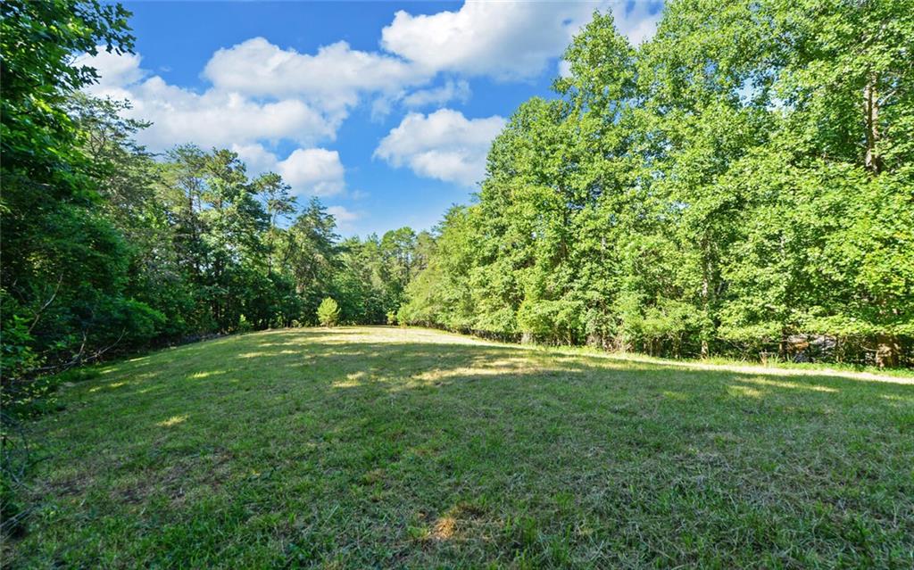 Beautiful building lot available in Sky Country! Located just 1 & 1/2 miles from downtown Dahlonega, this 2+ acre is ready for a home! Partially cleared with a beautiful open field with a lush wooded area in the rear. Wildlife is abundant in the region, including deer and turkey. The neighborhood has a voluntary HOA and has protective covenants. Located within city limits, the neighborhood is subject to city ordinances.