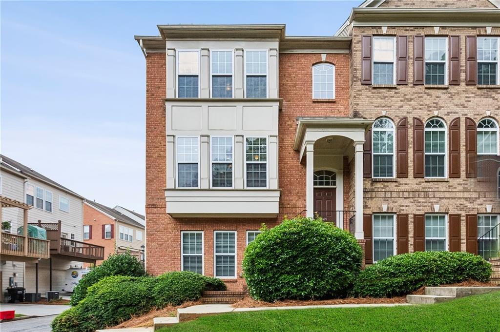 Welcome to 2149 Shoop Court — an inviting light-filled end-unit townhome tucked away in the heart of Smyrna’s sought-after Park Avenue community. From the moment you step inside, you’ll feel the perfect blend of warmth, elegance, and functionality in this thoughtfully designed three-level home. Offering 3 spacious bedrooms and 3.5 baths, this home is ideal for those who value both privacy and a sense of connection. The open-concept main level is an entertainer’s dream, featuring rich hardwood floors, high ceilings, and abundant natural light that floods the living space. The inviting family room centers around a cozy gas fireplace and flows effortlessly into the chef’s kitchen — complete with granite countertops, stainless steel appliances, a large island with seating, and a charming breakfast nook. Upstairs, you’ll find a peaceful primary suite retreat with a tray ceiling, walk-in closet, and a spa-like bath featuring dual vanities, a soaking tub, and a separate tiled shower. A second en-suite bedroom is also located upstairs, while a third private bedroom and full bath on the lower level offer ideal space for guests, a home office, or a quiet workout area. The two-car garage and ample storage add convenience, while the private rear deck provides a perfect spot to unwind with morning coffee or evening wine. Residents enjoy access to the beautifully maintained community pool and green spaces — all just minutes from Smyrna Market Village, The Battery, Truist Park, and easy access to I-285 and I-75.
Whether you’re looking for low-maintenance luxury or the perfect place to host friends and family, 2149 Shoop Ct is ready to welcome you HOME!