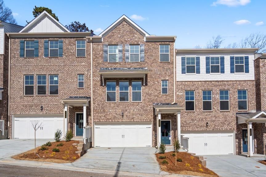 Brand new three-story townhome offering a bright and open space on the main floor. The main floor is an open-concept kitchen, featuring grey cabinets, a massive kitchen island, walk-in pantry, granite countertops. The owner's suite is on the top floor with a luxury bath offering a large shower, dual vanities and large walk-in-closet. A secondary bedroom and full bath are also on the top floor. An additional bedroom on the bottom floor with a full bathroom. Home is fully fitted with top-of-the-line appliances. Close to Truist Park (Braves Stadium), ATL airport, and midtown/downtown Atlanta with easy access to I-285 and I-20. Hardwood floors thoughtout home. Carpet in bedrooms.
