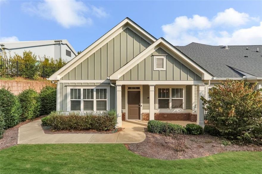 Welcome to easy, low-maintenance living in this beautifully maintained 2-bedroom, 2-bath townhome designed for comfort, convenience, and connection. Nestled in a thriving active adult community, enjoy privacy while still participating in neighborhood events, social gatherings, and resort-style amenities. Step inside to a spacious, open-concept floorplan filled with natural light—perfect for both relaxing and entertaining. The living and dining areas flow seamlessly into the well-appointed kitchen, creating a warm and inviting space to call home. The primary suite offers a peaceful retreat with a private bath and generous closet space, while the second bedroom provides flexibility for guests or a home office. Above the attached garage, you’ll find a versatile room—ideal for extra storage—with convenient access to the attic for even more space. Enjoy the best of both worlds: a quiet, low-maintenance lifestyle with access to a vibrant, active community. Minutes to downtown Woodstock, shopping, dining, and Northeast Cherokee Hospital.