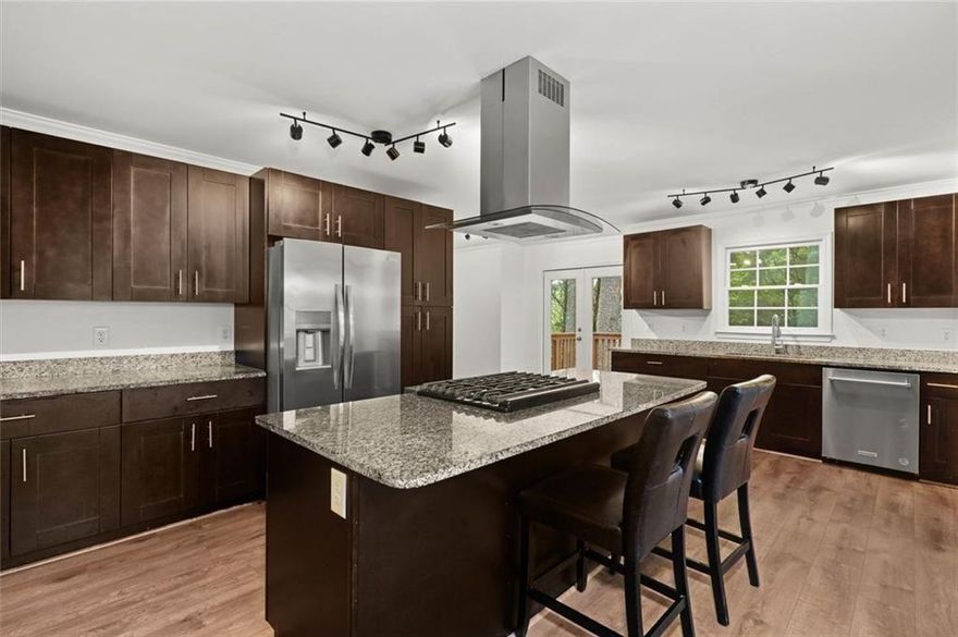 Welcome home to a beautifully rebuilt 3-bedroom, 2-bath ranch in the heart of desirable East Cobb, offering comfort, quality, and charm on a tranquil street. Fully reconstructed in 2022, this open-concept home blends modern finishes with timeless appeal and is move-in ready with no updates needed.

Inside, bright, freshly painted interiors and new rich flooring invite you into a spacious living area. An updated kitchen and pristine baths complement comfortable living on the main floor. Downstairs, a partially finished daylight basement awaits—fully stubbed for a bathroom—offering endless potential for a media room, workout space, or guest suite while maximizing functional living space.

Outside, the large, private yard is a true retreat (lot is much larger than the records show) perfect for weekend barbecues, playtime, or peaceful mornings under the sky. The new driveway adds to the homes’ pristine, welcoming curb appeal. No HOA fees! Must See! 

Situated within the highly acclaimed Walton High School district, recognized among the top public high schools in Georgia, this home also feeds into Dodgen Middle School and Murdock Elementary. With easy access to I-75, the location effortlessly connects you to a wealth of shopping, dining, and recreation East Cobb is famous for.

2674 Skylane Drive offers an unbeatable combination: a fully modernized, move-in ready home, a full basement, a peaceful yet connected location, and access to top-tier schools. Come see why this one feels like home from the very first step.