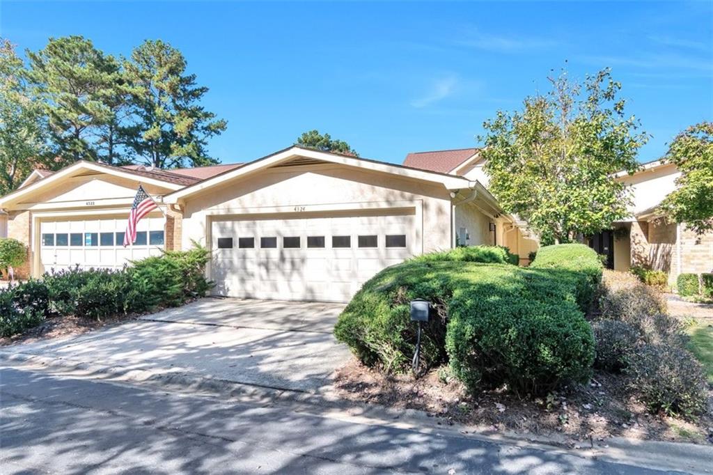 Great cluster home in popular Village Oaks | 3 BEDS & # 3 Full Baths! | Light & Bright | Spacious Open floorplan | 1 Bedroom and 1 Full Bath on the Main; 2 Bedrooms and 2 Full Baths up | Laundry Room up | 2 Private Courtyards | Fireplace Great Room features built ins | Kitchen has stained cabinets and offers cooktop oven range, microwave, dishwasher and refrigerator | 2 Car garage | Quiet Neighborhood | Top Rated Dunwoody Schools; Dunwoody Elementary Stem Certified, Peachtree Middle, DHS | Walk to Pernoshal Park |Convenient to shops, restaurants, groceries and just minutes to 285 | Move in ready and available now!