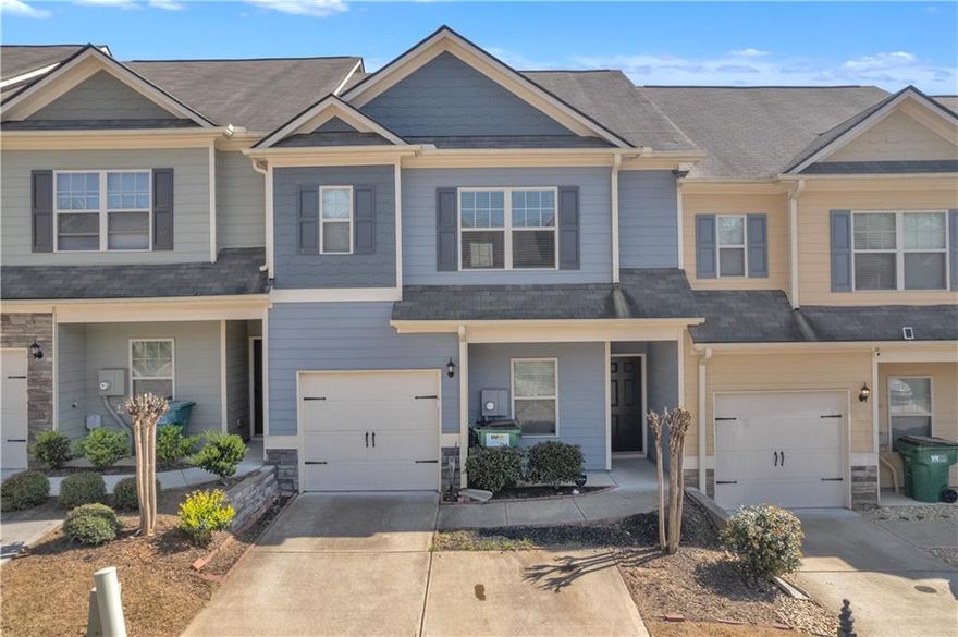 Seller Offering $10,000 Toward Buyer’s Closing Costs!
Fall in love with this beautifully maintained craftsman-style townhome, built in 2020 and tucked inside one of the area’s most desirable communities. It’s your own private retreat—complete with resort-style amenities that make every day feel like a getaway. Cool off in the sparkling pool, challenge friends on the tennis courts, unwind at the clubhouse, let the kids explore the playground, or treat your pup to some off-leash fun at the dog park.
Inside, the open-concept layout welcomes you with warmth and flexibility. The main level offers a versatile bonus area—perfect for a home office, creative studio, or quiet reading corner. Upstairs, the spacious primary suite features soaring ceilings and abundant natural light, joined by two generous secondary bedrooms and a conveniently located laundry room.
With 2.5 baths, a one-car garage, and driveway parking for two more, this home checks every box. Step out to your private concrete patio—ideal for morning coffee, evening cookouts, or simply relaxing under the stars. And with yard and exterior maintenance included, your weekends are completely worry-free.
The HOA is just $95 per month, covering lawn care and community amenities—offering incredible value and peace of mind.
Perfectly situated just minutes from I-575, you’ll have quick access to Woodstock, Canton, The Outlet Shoppes at Atlanta, The Mill on Etowah, and Canton Marketplace. The ideal blend of comfort, convenience, and community—all wrapped in one irresistible package.