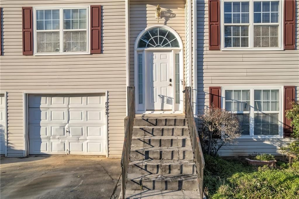 Photo of 8039 Mustang Lane, Riverdale, GA 30274 (MLS # 7725566)