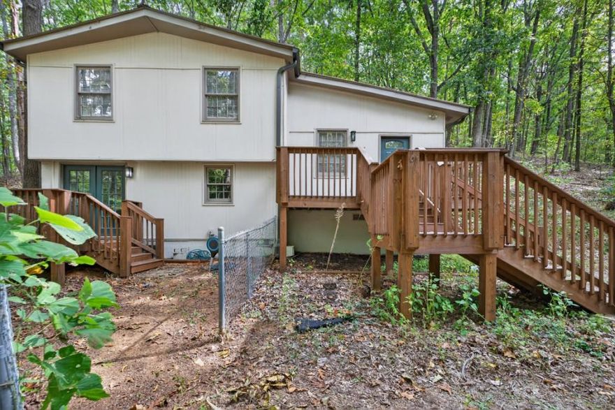 Beautifully renovated home situated on a private 1-acre lot. This charming property offers 3 bedrooms, 2 bathrooms, and an additional bonus room, providing ample space for comfortable living. As you step inside this gorgeous home, you'll immediately notice the bright and open living room, creating a welcoming atmosphere for relaxation and entertainment. The main floor features a spacious kitchen, a convenient laundry room, a dining room perfect for gatherings, and a versatile bonus room that can serve as an office space or a hobby room. Heading upstairs, you'll discover the master bedroom along with the secondary bedrooms. The bathrooms are thoughtfully designed to provide both functionality and style. One of the highlights of this property is the amazing back deck, which boasts a unique rock incorporated into its design. This creates a visually appealing and distinctive outdoor space where you can unwind and enjoy the serene mornings, listening to the soothing sounds of wildlife. The privacy offered by the surrounding landscape enhances the tranquility of this outdoor oasis. This home has newer HVAC units, decks, interior and exterior paint, updated electrical panel, flooring throughout as of 2023. Tin roof. Overall, this renovated home provides a blend of modern updates and timeless charm, all set in a peaceful and secluded setting. No HOA. Qualifies for USDA. As Is. Well, Septic and Termite inspection have been completed and letters are available.