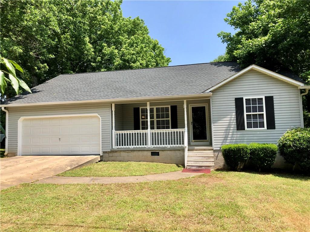 Cute Country one level starter home with two car garage. Open living area with a split bedroom plan. Open kitchen with dishwasher and stove. Large deck with fenced area for pets. Model school district, won't last long!
