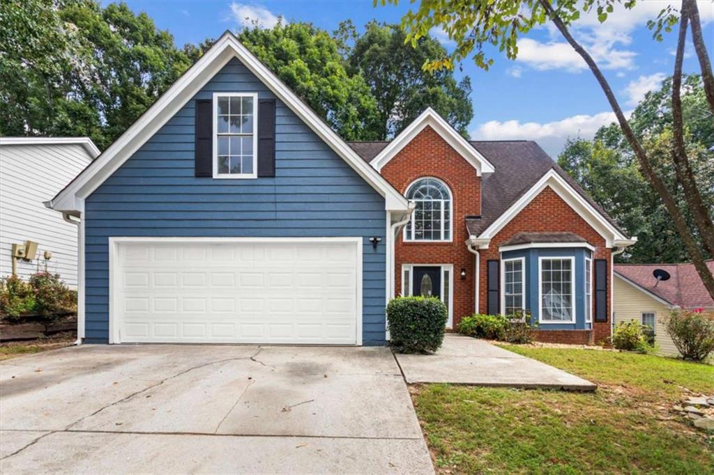 Welcome to this beautifully updated and well-maintained 4 bedroom, 2.5 bath home in the heart of Norcross, GA! The main level features a spacious master suite with a luxurious master bath, offering the perfect private retreat. The open living room boasts soaring ceilings and a gorgeous upstairs catwalk overlooking the space, adding both charm and character. An updated kitchen flows seamlessly into the living areas, ideal for entertaining or cozy family nights. Upstairs, you'll find three additional bedrooms, each spacious and full of natural light. Step outside to a private, fenced backyard-perfect for pets, gatherings, or simply enjoying the outdoors. This home truly combines comfort, style, and functionality in one of Norcross's most convenient locations!