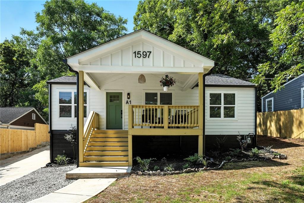 Be the first to call this all-new guest suite home—perfectly placed just steps from East Atlanta Village’s cafés, restaurants, and shops, and a quick hop to I-20, the BeltLine, and everywhere you need to be. At this price point and in this walkable location, opportunities like this don’t come around often. Inside, an airy, modern layout pairs clean finishes with a bright living area that opens to a charming side-yard patio—your spot for morning coffee or an evening wind-down. The sleek kitchen centers around a functional island and efficient cooktop (note: no oven), ideal for quick meals and weekend breakfasts. A serene bedroom features a generous walk-in closet, and the fresh, contemporary bath completes the suite. Thoughtful extras include one off-street parking spot and the peace of mind that comes with brand-new construction. Modern, private, and move-in ready—this guest suite delivers standout value in a prime intown location. Welcome Home!