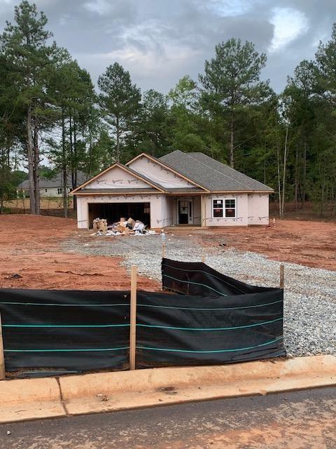 AMAZING NEW RANCH ON 1 ACRE WITH BRICK WATER TABLE. Awesome Top Selling 3BR/2BA Ranch Home on a Beautiful Wooded Homesite. Home Features Spacious kitchen with gorgeous quartz island, upgraded painted cabinets, farmhouse sink, upgraded tile backsplash & stainless steel appliances. Expansive family room with a cozy, relaxing fireplace. Large Master Suite with walk-in closet, dual quartz vanity and 5' shower. Two more sizable secondary bedrooms. LVP THROUGHOUT WHOLE HOUSE! Includes 4 zone irrigation system. ** Only $1,000 Earnest Money** Located in highly sought after, beautiful Jackson County, GA and convenient to the Pendergrass/Jefferson Exit or Maysville/Commerce Exit on I-85 for quick travel to Atlanta, GA, Lake Hartwell & Greenville, SC, as well as Hwy 129 for easy access to Athens, GA!!! Multi-Award Winning, Family Owned Builder. 1 Yr Builder's Warranty, 2 Yr Systems Warranty, 10 Yr Structural Warranty, 2 Pre-Closing Walk Throughs & a Smart Home Package. Call for builder incentives. Contingency acceptable if other property is listed or under contract. "Don't miss your chance on a beautiful new home in Eagle Heights with a budget Friendly HOA. Eagle Heights is convenient to dining, shopping and easy access to Greenville, SC, Atlanta, Ga, and I-85.`` Check out our beautiful, decorated model home in Eagle Heights for current design trends. Model Home Sun and Mon 1 pm-6 pm, Tue-Sat 11 am-6 pm. "Renderings and plans are for illustration purposes only and may include additions, options or modifications not part of the standard offering, and are subject to change without notice or obligation".