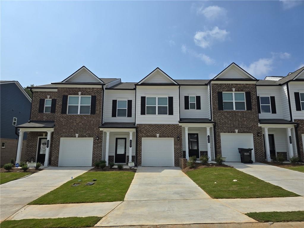 Don't miss out on this brand new 3 bed 2.5 bath Townhome. The property features LVP flooring on the main level with carpet upstairs. Spacious family room with with modern electric fireplace. The kitchen features plenty of cabinet space, stainless steel appliances, granite counterops, tile backsplash and provides a view of the family room. Half bath, conveniently located on the main level. Spacious primary bedroom with walk-in closet. Primary bath features a double vanity and huge shower. Laundry room is located upstairs. Guest bath features a shower/tub combo. Small dogs are on a case by a case basis with a $250 pet fee due at move-in. No cats. The community features a dog park and playground, located behind the unit. Renters insurance is required. Located minutes from I-75.