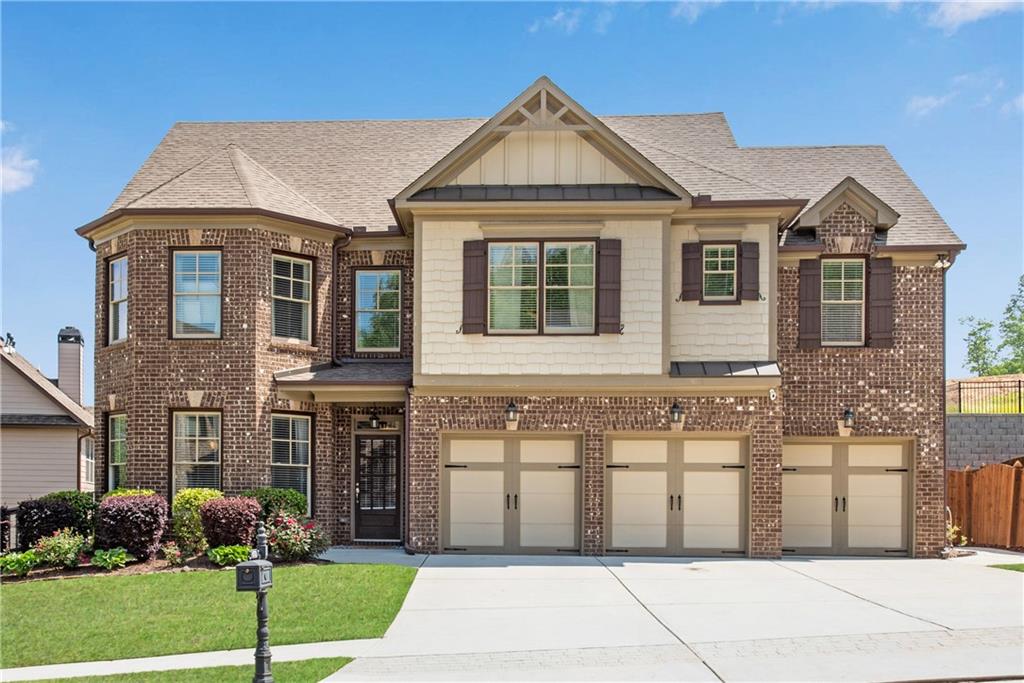 Labb Homes popular Elliott Plan w/3-car garage! Laminate flooring on ENTIRE main level. Extensive trim package includes coffered ceilings in formal dining room and great room! White island kitchen w/gas cooking and walk-in pantry views the great room w/brick fireplace and access to the rear covered porch. Upstairs hallways features built-in desk/home management area. Spacious upstairs laundry room. Primary suite w/sitting room, HUGE double shower and custom closet! Fenced backyard w/expanded patio areas including sidewalk to front yard. Popular Swim/Tennis Community.