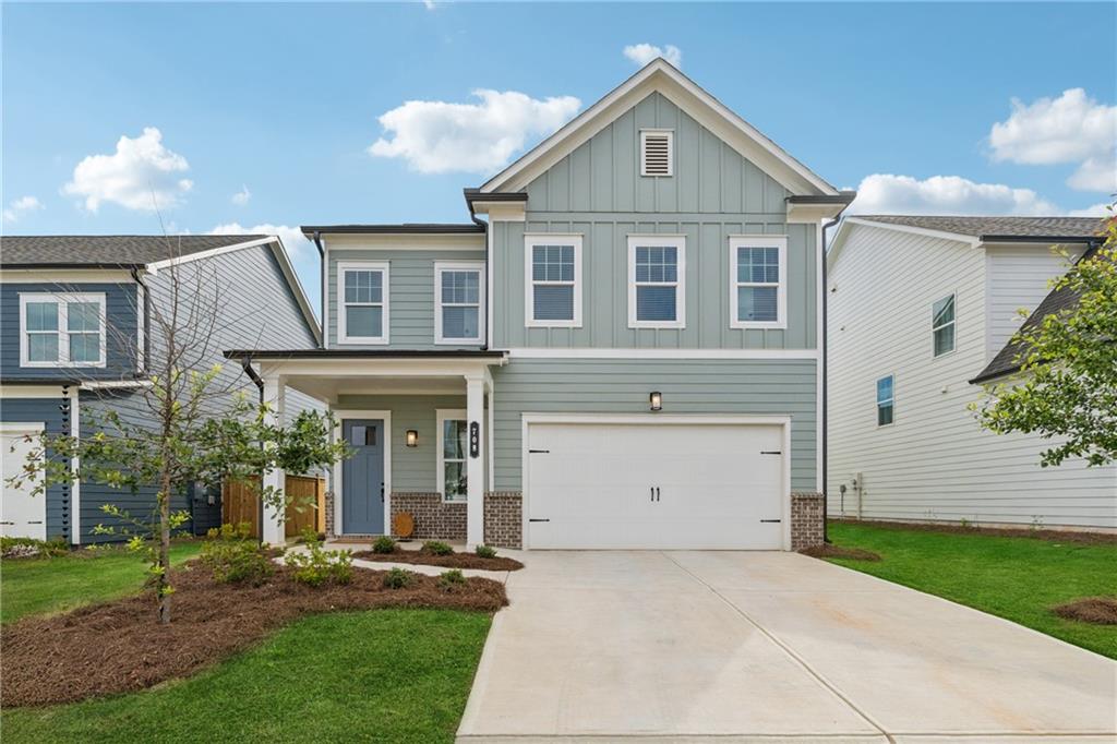 Don’t miss this beautiful 3-bedroom, 2.5-bath home with over 2,000 sq ft of stylish living space in the sought-after Madison at Buice Lake community. Just 1 year old, this home features 10’ ceilings, luxury vinyl plank flooring, and an open-concept layout with a spacious kitchen offering white cabinets, quartz countertops, a large island, and designer finishes. Upstairs includes generous bedrooms with walk-in closets, a luxurious primary suite with a tiled walk-in shower and double vanities, plus a laundry room with washer, dryer, and utility sink included. Enjoy a flat, fenced backyard, two-car garage, and access to resort-style amenities: pool, kiddie pool, pickleball courts, firepit, playground, and scenic sidewalks. Minutes to Downtown Woodstock, top-rated schools, and The Outlet Shoppes at Atlanta.