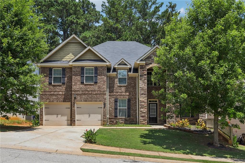 Brick Beauty in the Heart of Fairburn! Over 4,200 Sq Ft of Impressive Living Space
Welcome to this stunning 5-bedroom, 4-bathroom brick home that truly has it all. From the moment you step into the dramatic two-story foyer, you’ll be captivated by the spacious, light-filled layout and elegant design.
Perfect for both everyday living and entertaining, the open floorplan features a formal dining room, a spacious family room, and a chef-inspired kitchen that flows effortlessly to the covered patio—ideal for relaxing or hosting guests year-round.
Retreat upstairs to the oversized primary suite, complete with a private sitting room, perfect for unwinding after a long day. A large bedroom and full bath on the main level offer flexibility for guests or multigenerational living.
Located in sought-after Fairburn, this home offers space, comfort, and style in one perfect package. You truly have to see it to believe it!