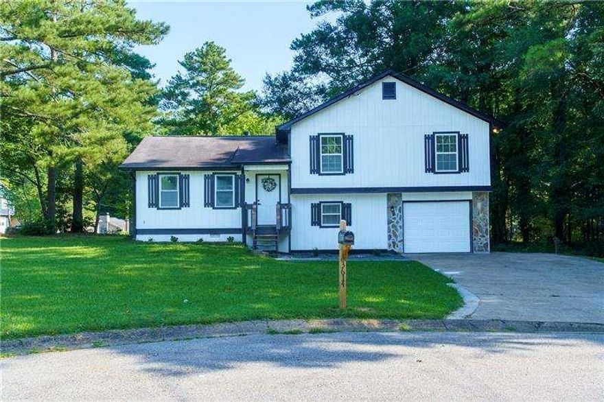 Fully Renovated Home! Price reduction and the seller is Super motivated to close soon on this fully renovated home! A great price, loads of updates, and No HOA...just grab your keys and call this home yours! Welcome in to this stunning remodeled home with NO HOA! Enter into the split level home right into the main living quarters where you will find the family room, kitchen, and dining area. The family room is spacious and offers a view into the kitchen. The kitchen offers totally updated fixtures including white cabinets, countertops, tile backsplash, and new stainless appliances. The open concept, casual dining area is just off the kitchen. Steps away is the upper level where you will find three bedrooms and two full bathrooms. The master bedroom is a great size, features an updated closet, and an en suite bath with tile shower. The additional two bedrooms are also spacious and share the second full bath with remodeled bath. Enjoy bonus living space in the lower level where you will find an open area perfect for a home office, media room, or man cave! There is also a fourth bedroom on this lower level as well! Enjoy the outdoors from your back deck overlooking the large backyard. This home sits on a wonderful cul de sac lot with both a front and back yard for your enjoyment and easy to maintain landscaping. The flat driveway leads to the garage and provides additional parking. Updates Include: neutral paint throughout, new flooring, new appliances, totally updated bathrooms, new cabinets, new vanities, tile backsplash, tile shower, and updated fixtures throughout. All with NO HOA in the heart of Cobb County!