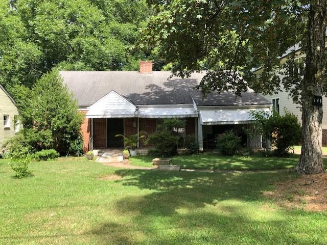 So much potential, so much promise! 2 bedrooms in expandable attic upstairs. Formal living and dining room. Front porch, totally fenced backyard. Excellent school system: City of Decatur