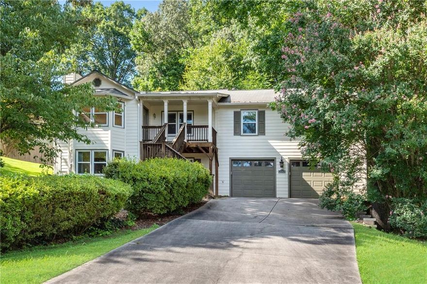 Do not miss this incredible opportunity in the Walton School District! Heritage Trace offers the best of East Cobb living. This raised ranch on a basement includes a full in-law/teen suite and is priced to reflect the cost of a kitchen remodel. The main level features an open floor plan with hardwood and luxury vinyl throughout, oversized rooms, and abundant natural light. Secondary bedrooms include large closets and new windows. The kitchen overlooks a large, level, fenced backyard--perfect for family activities and entertaining. The finished basement offers an above-grade living room, bedroom, junior kitchen, half bath, and plenty of storage, making it ideal for guests, teens, or extended family. This home combines space, flexibility, and location. Schedule your showing today--this one will not last!