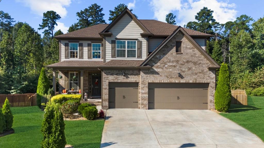 This stunning 5-bedroom, 5-bathroom residence has been thoughtfully updated and impeccably maintained, offering both elegance and functionality. Nestled on a quiet cul-de-sac, the home showcases a brand-new roof, professional design touches throughout, and hardwood floors that flow seamlessly across the main level. The heart of the home opens to a spacious living area and a beautifully landscaped backyard oasis. Enjoy outdoor living on the back deck with a retractable awning, overlooking lush gardens, fruit trees, a shed, and a sparkling pool with a dry-below sitting area for year-round entertaining. The fenced backyard ensures both privacy and charm. Upstairs, the luxurious primary suite features a large sitting room and walk-in closet, while additional bedrooms and a media room provide ample space for relaxation and family living. The finished basement is an entertainer's dream with a full kitchen, bedroom and bath, theatre, gym, and walk-out access to the pool area. Additional highlights include a three-car garage with epoxy floors, abundant storage, and a serene setting with tons of backyard privacy. This move-in ready home combines quality, design, and lifestyle in one incredible package.
