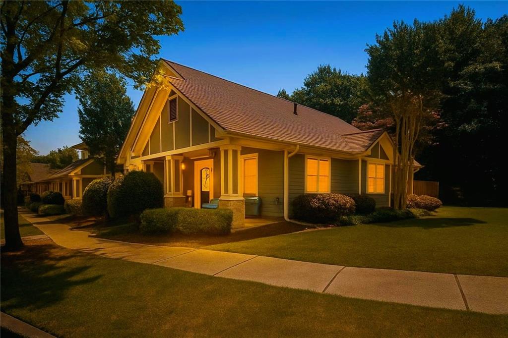 Welcome Home to your beautiful move-in ready Ivey Parc craftsmen! Fresh interior paint and carpet, new HVAC and 4 year old roof. The kitchen features hardwoods, stainless steel appliances and plenty of natural light. Attractive trim details and stylish lighting/fans throughout the home. Enjoy this premium corner lot on the cozy front porch and private back patio oasis! Retreat to your primary suite on the main level with generous walk-in closet. Convenient to sought-after schools, shopping, and restaurants. Don't miss this great opportunity to live in the heart of Grayson!