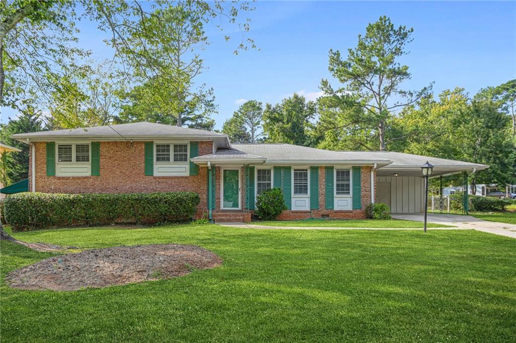 Welcome to 4357 Lafayette Lane – A perfect blend of comfort and convenience! This charming 4-bedroom, 3-bathroom home is tucked away in a quiet College Park community while still offering easy access to the airport, downtown Atlanta, and major highways. Step inside to an inviting open-concept main level, featuring a spacious living room filled with natural light, a modern kitchen with updated appliances, cabinets, countertops, and a dining area perfect for gatherings. Upstairs, you’ll find a generous primary suite complete with a walk-in closet and a private bath, along with two additional bedrooms and a full bath for family or guests. The finished basement expands the living space with an additional bedroom, a full bathroom, and a large bonus room—perfect for a home theater, gym, or home office. The huge, fenced-in level backyard offers endless possibilities—plenty of space for entertaining, outdoor play, gardening, or simply relaxing in privacy. Located just minutes from downtown College Park, Hartsfield-Jackson Airport, and local shops and dining, this home is a wonderful opportunity for first-time buyers, families, or investors. Don’t miss your chance to own this beautiful home in a prime location! Schedule your private showing today.
