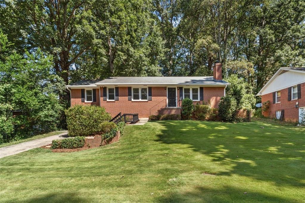 Welcome to this classic 4-bedroom, 2-bath brick ranch built in 1957, brimming with character and timeless details. Step inside to find solid hardwood floors flowing throughout and beautifully preserved original tiled bathrooms that showcase mid-century charm. The spacious layout includes a full basement, offering endless possibilities for recreation, hobbies, or additional storage. A one-car garage provides both convenience and functionality. Perfectly located near the vibrant Smyrna Market Village, this home places you minutes away from local dining, shopping, and community events, all while enjoying the comfort of a quiet residential neighborhood.