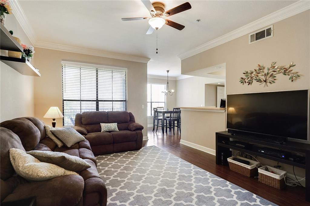 Immaculate Brookhaven/Buckhead condo featuring a bright open concept.  Spacious living area and kitchen with access to cheerful patio and courtyard views.  Owners suite offers a brand new spa-like shower, walk-in closet and lots of natural light.  Spacious secondary bedroom/potential 2nd owner's suite features a walk-in closet and large bathroom.   Newer: ss appliances, fixtures, windows, paint.  Located in the popular Peachtree Place community offering resort style living; gated entrance, inviting pool area,  2 story fitness facility, clubhouse, dog walk, trash valet.