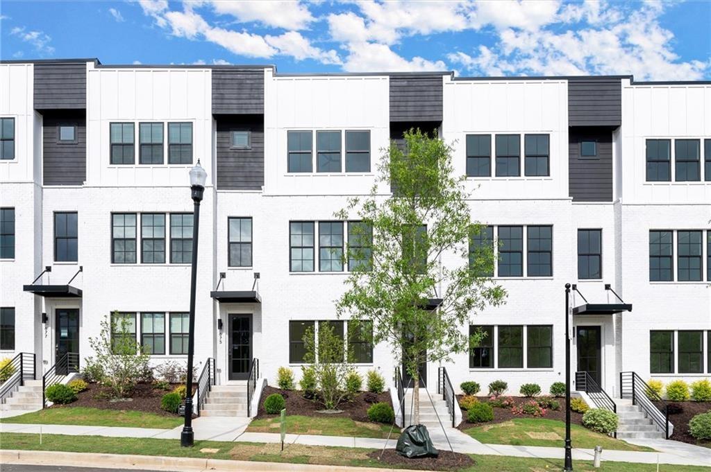 New Construction Luxurious and Modern Townhome in The Gathering Alpharetta, a new community, just minutes from downtown Alpharetta, Avalon and top-rated schools as well as prime access to the vibrant Alpha Loop. Enjoy the convenience of easy access to a lot of shops, dining options, and entertainment venues just moments away from your doorstep. This thoughtfully interiors designed home offers 4 bedrooms and 3.5 bathrooms. As you enter the first floor, you'll find a spacious guest suite complete with its own private bathroom, ideal for visitors or a home office. Ascend to the second floor to experience the heart of the home, the open concept living area designed for both relaxation and entertainment, featuring 10 ft ceilings and large windows, seamlessly flows into the dining area and gourmet kitchen. The kitchen is a chef's dream, boasting Kitchen Aid stainless steel appliances, quartz countertops, sleek cabinetry and a generous island. Large walk-in pantry. A bonus space can be used for kitchen office or extra storage. The third floor is dedicated to privacy and tranquility offering the primary suite and two additional bedrooms. The luxurious Primary Suite features a walk-in closet and spa-like en-suite bathroom with a raised maple dual vanity and glass enclosed shower. Two additional well-appointed bedrooms share a stylish full bathroom. Two car garage. Enjoy the Community Amenities such as the Community Garden, Firepit and Dog Park. Owner requires excellent credit score 720+, clean credit, 3X monthly rent income.