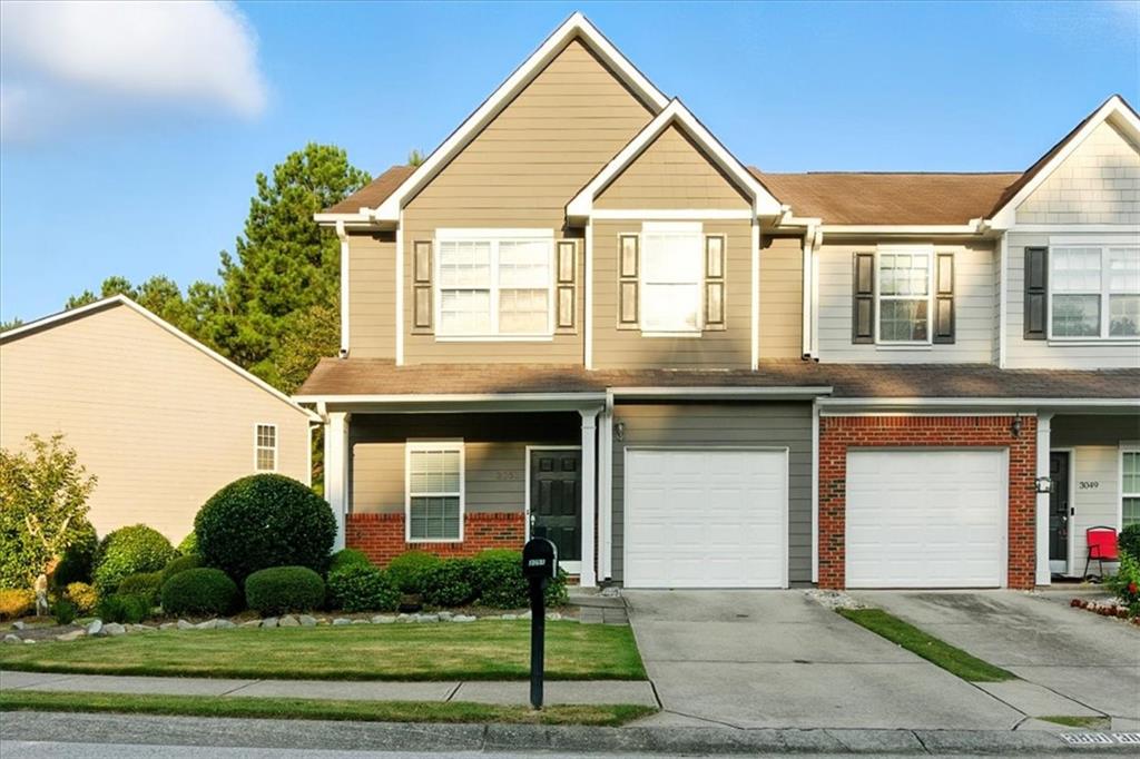 Don't miss out on this updated 3 bed 2.5 bath Townhome located in Buford mins from Mall of Georgia. The unit features updated lvp flooring throughout. Spacious family room with open dining area. The kitchen features plenty of cabinet space and provides a view of the family room. Spacious primary bedroom with huge walk-in closet. Both full baths feature updated vanties and shower/tub combos. The laundry room is located upstairs and features a stacked washer and dryer. End unit provides plenty of privacy. New HVAC 2 years ago. Exterior maintenance, landscaping and water are included in the monthly HOA fee. Community swimming pool.