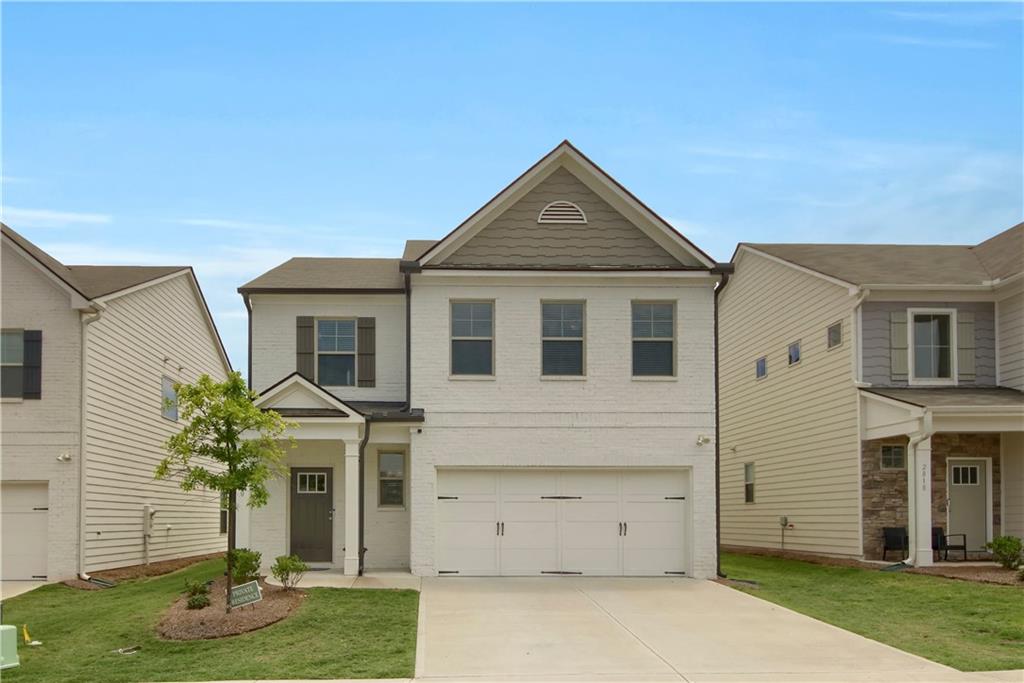 Modern Comfort Meets Convenience in College Park
Welcome to this beautifully crafted 3-bedroom, 2.5-bathroom all-electric home, two years old, gently lived-in and designed for modern living. Located in a growing, amenity-rich community in College Park, this home offers stylish comfort, energy efficiency, and unbeatable access to everything Atlanta has to offer.
Step into an inviting foyer and enjoy the open-concept main floor featuring durable luxury vinyl flooring, neutral paint tones, and an abundance of natural light. The cozy living room is a true showstopper with coffered ceilings and a charming fireplace—creating an elegant yet comfortable space perfect for both everyday living and entertaining.
The kitchen is the heart of the home, complete wcomplete with stylish pendant lights over a large island, stainless steel appliances, built-in microwave, and sleek quartz countertops. Quartz continues in the bathrooms, offering both durability and sophisticated style throughout the home.
Upstairs, you'll find a flexible loft space ideal for a home office, media room, or play area, along with the convenience of an upstairs laundry room. The rear-facing owner’s suite offers a private retreat with a walk-in closet and an ensuite bathroom featuring a double vanity, separate soaking tub, and walk-in shower. One of the two secondary bedrooms also features a walk-in closet, while the third offers generous storage space.
Double-paned windows enhance energy efficiency and quiet, while a built-in security system provides added peace of mind. A two-car garage and builder’s warranty still in place provide long-term value and reassurance. Enjoy outdoor living on the patio and a large, open backyard ready for your personal touch.
The community features family-friendly amenities, including a splash pad perfect for warm-weather fun. Located less than two miles from Hartsfield-Jackson Airport, shopping, and dining—with easy access to I-85—you’re just 20 minutes from the heart of downtown Atlanta. With new homes still being built in the neighborhood, now is the perfect time to become part of this vibrant and expanding community.
Don’t miss your chance to own this move-in-ready gem—schedule your showing today!