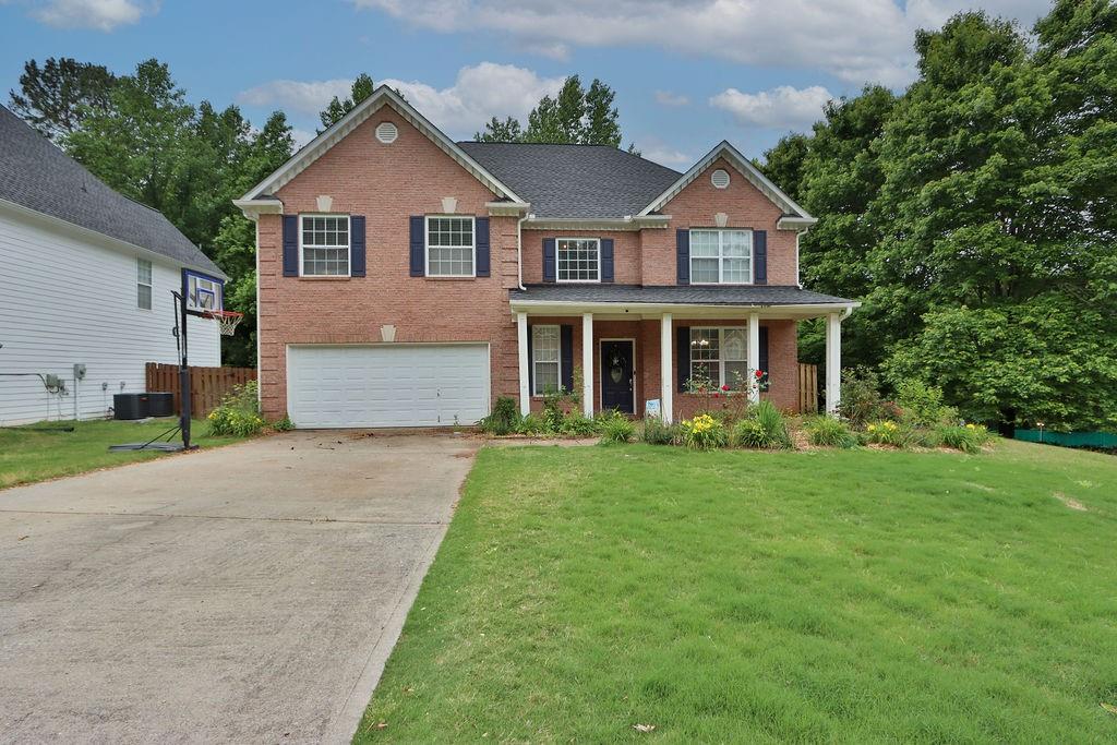 Can't beat this location in Lawrenceville! This 4 bed and 2 1/2 bath is located right off of Sugarloaf minutes from 316. A short drive into downtown Lawrenceville with tons of shopping and restaurants. This beauty has a large kitchen with a pantry, plenty of counter space, and an open view of the living room. Main floor is hardwood floors and an open floor plan. Master bedroom is spacious and the master bathroom has a tile shower, tile sound around the jetted tub, and a massive closet. Bedrooms are all a good size with nice closet space. Backyard is completely fenced in giving you privacy in the middle of the city.