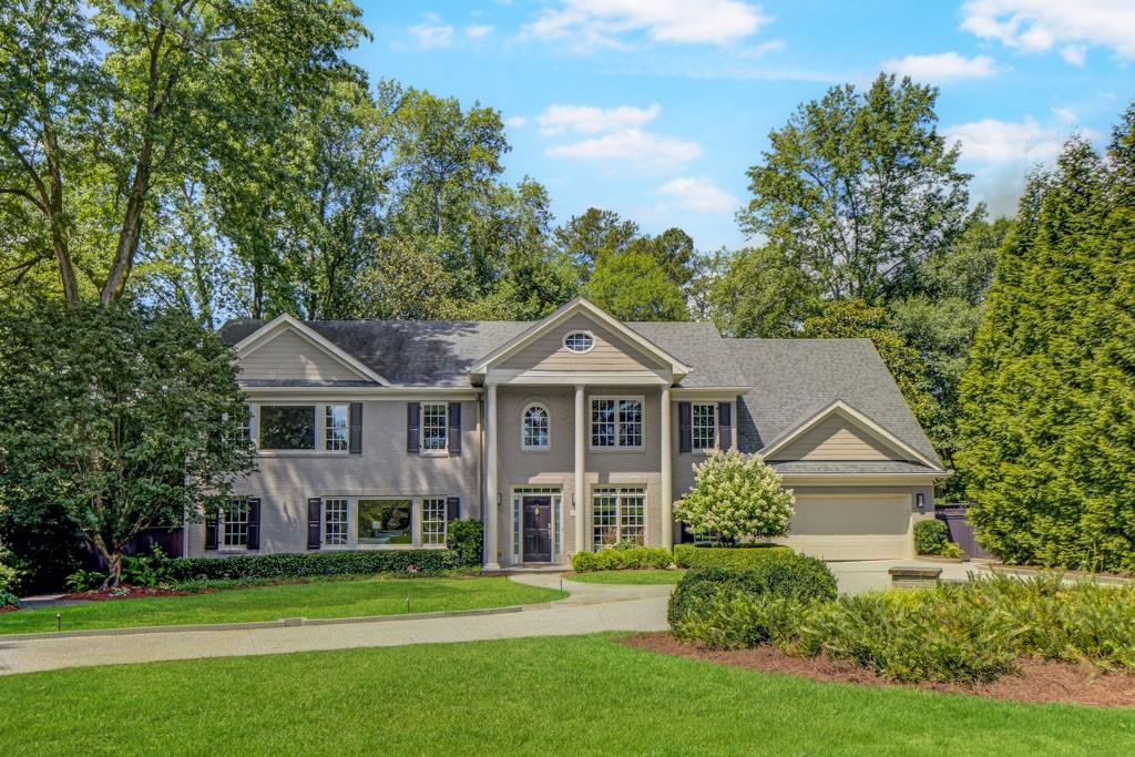 Exceptionally well-maintained home in highly desirable Chastain Park. This beautiful traditional home offers a very flexible floor plan with 4-6 bedrooms plus a main level office and additional flex space. The main level features a fireside family room with a picture window view and French door access to the beautifully landscaped, level and fenced backyard; kitchen equipped with stainless steel appliances, granite counters, and abundant custom cabinets, many including pull out shelving/drawers; light and bright dining room; spacious office; and an oversized bedroom/in-law suite/additional living space that includes a full bathroom with updated vanity and newly tiled shower as well as a huge walk-in closet. Front and rear stairs lead to the second level, where you’ll find 2-3 secondary bedrooms plus an additional room and a shared bath– the combination of rooms could house a playroom, hobby room, or second office depending on your needs. Retreat to the primary suite featuring a generous bedroom overlooking the golf course; his and her walk-in closets with plentiful custom shelving; and a luxurious bath with separate shower and soaking tub, dual vanities and a constant heated floor for your comfort. The laundry room is conveniently located upstairs. You will love the views front and back from this home. Several windows are tinted to minimize glare and assist with energy savings. There are remote control blinds in the family room; new hardwood flooring throughout the upstairs and in the main level bedroom; refinished hardwood flooring on the main level; fresh paint throughout the interior and garage; and very good closet space throughout. Enjoy the Trex deck with water feature, rear flagstone patio, plus charming gazebo in the front yard. The water heater, garage door, gutters and downspouts, electrical panel, front shutters and columns, and landscape lighting have all recently been replaced. The front and back yards have been professionally landscaped/hardscaped. All of this, plus Chastain Park and all of its amenities in your front yard. Experience all Chastain Park has to offer – trails, golf, NYO baseball, award-winning playground, swimming pool and swim team, tennis, arts festivals, Synovus amphitheater, horse park, The Chastain restaurant, plus be among the first to enjoy the park’s expansion featuring 40+ acres of new green space.