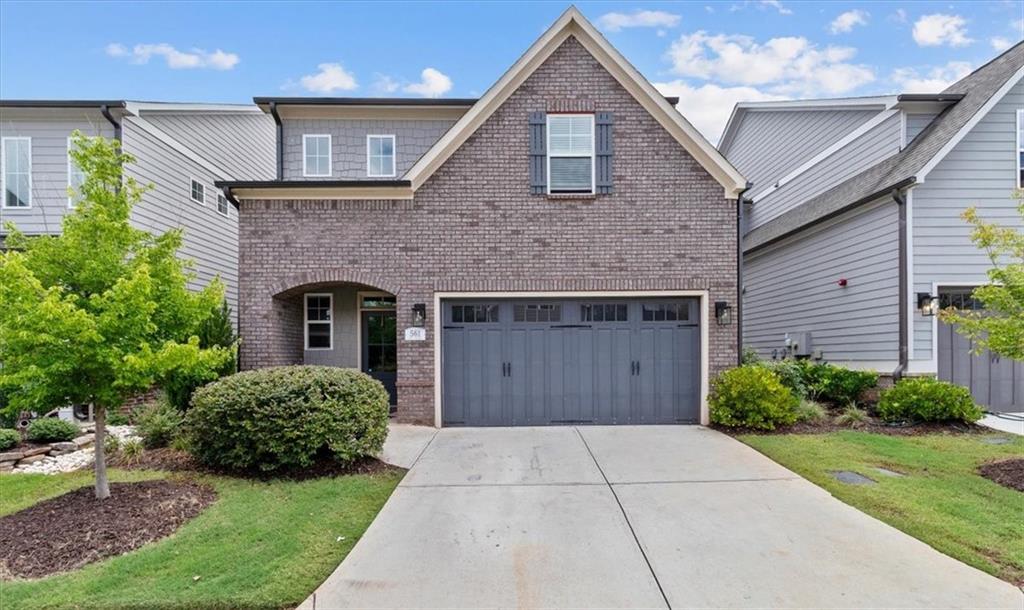 Beautiful Brick front home in sought-after Promenade at the Square! This 4BR/3.5BA beauty offers nearly 2,700 sq ft of open living space with a spacious family room, gourmet kitchen featuring granite countertops, stainless steel appliances, gas cooktop, island & walk-in pantry. Main-level owner’s suite includes a dual vanity, large shower & walk-in closet. Upstairs: spacious loft, 3 bedrooms & 2 full baths. Enjoy lawn care, sidewalks & pool—just minutes to Marietta Square, parks, golf, shopping & I-75.