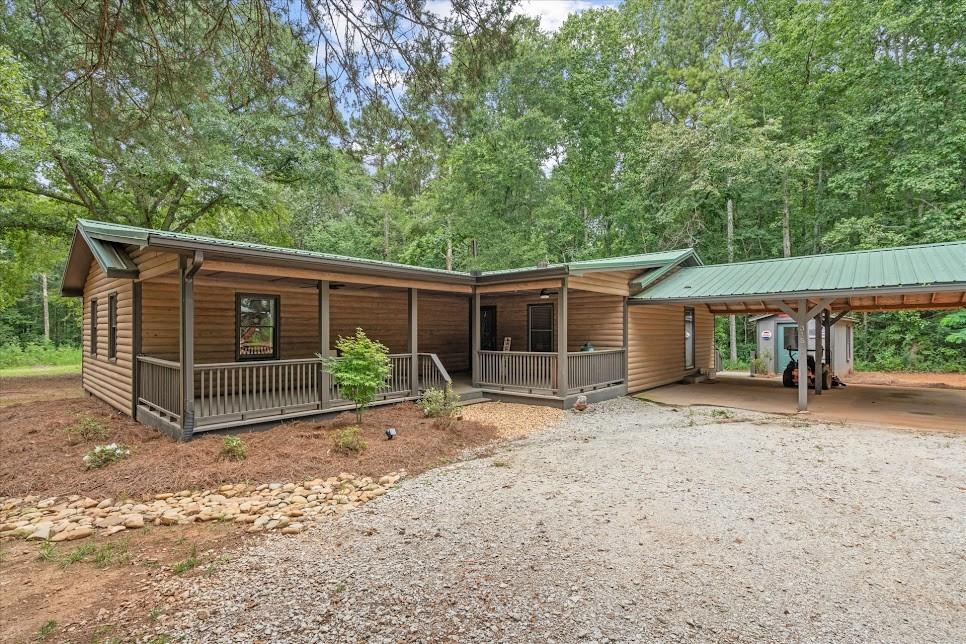 Beautifully Renovated Ranch on 1 Acre in the Central School District! This 3-bedroom, 2-bath home has been completely updated inside and out, offering modern comfort and style in a peaceful setting. The oversized primary bedroom suite is a true retreat, and the split-bedroom layout provides privacy for all. Major updates include a new HVAC system, water heater, and plumbing, giving you peace of mind for years to come. Cosmetic upgrades showcase a fresh, modern feel with new appliances, new flooring, fully renovated bathrooms, a stunning new kitchen with an island, fresh paint, a new deck, updated fixtures, and more. Outside, enjoy the space and versatility of a full 1-acre lot with a detached workshop and storage shed, both equipped with electricity. Perfect for hobbies, projects, or extra storage. Well letter and termite letter are already on file, making this home truly move-in ready. Don't miss your chance to own this turnkey property in a highly desirable location on a private drive!