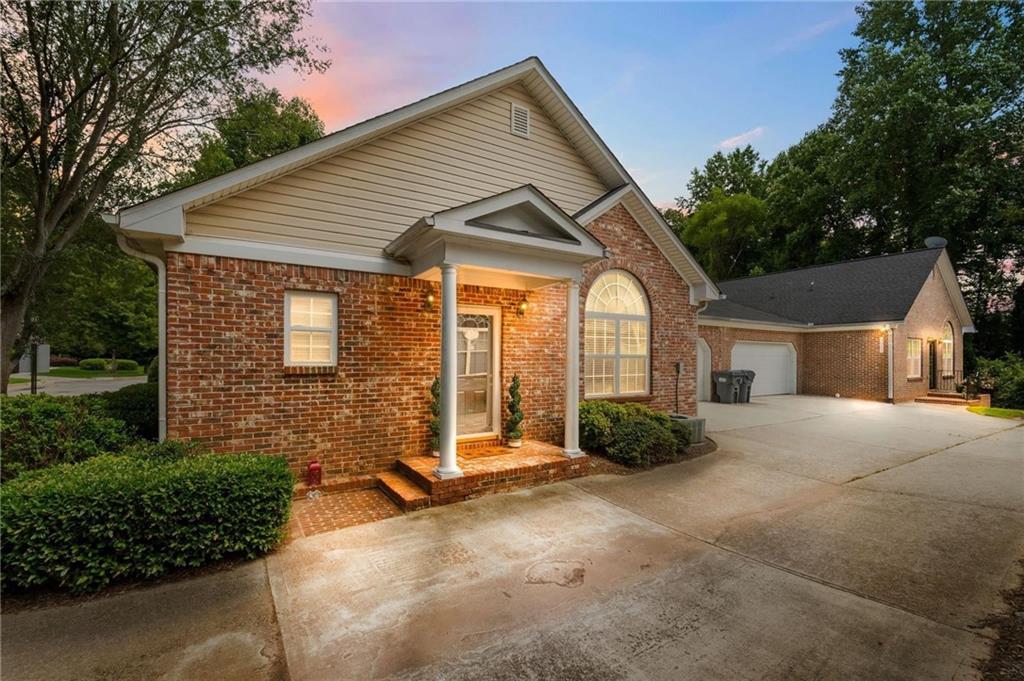 Back on the market at no fault of the Seller. Lovely and spacious 4-sided brick ranch home in a beautiful condominium community with 2 bedrooms, 2 baths, eat-in kitchen, pantry, sizeable laundry room with built-in cabinetry, adjoining dining room and substantial family room with inviting fireplace and soaring cathedral ceiling, sprawling primary retreat complete with sitting area, generous dual closets, dual vanities and jetted tub, relaxing back patio, and a 2-car garage on a cul-de-sac lot where there is additional visitor parking. There's so much new to love about this home including the new double back door by Renewal By Anderson, a new stove and range hood, new neutral interior paint, new luxury vinyl plank flooring in the kitchen and primary bathroom, new solid surface kitchen countertops, new kitchen sink and new kitchen faucet. Just envision yourself residing in this quiet and charming environment with amenities that include a clubhouse, community pool, sidewalks and streetlights. Included in the monthly association fees are lawn and dwelling exterior maintenance, water service, trash service, termite service, dwelling hazard insurance and common area maintenance and insurance. Welcome to Easy Living!!
