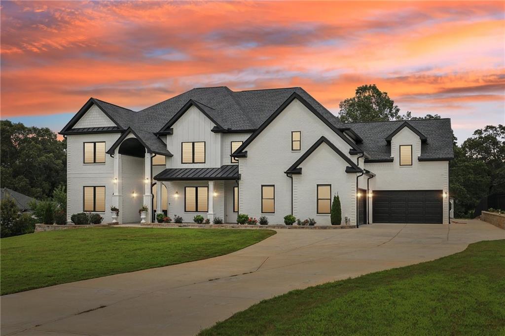 Welcome to a residence that epitomizes refined elegance and modern luxury. This exceptional home features expansive living spaces designed for both comfort and sophistication. The open living room is bathed in natural light and seamlessly connects to a chef’s kitchen, complete with high-end finishes and a large walk-in pantry.
The primary suite is a lavish retreat, featuring a designer closet with direct access to the upstairs laundry and a spa-like bathroom with a double-sided shower and a separate soaking bath. The upstairs flex room, complete with a wet bar and covered balcony, offers a sophisticated venue for gatherings.
The home also includes a covered fireside patio, ideal for intimate gatherings or relaxing evenings.
Step outside to a private backyard oasis, where meticulous landscaping surrounds a tranquil koi pond. The secure fenced perimeter creates an ideal space for outdoor enjoyment, whether for peaceful moments or elegant entertaining.
Adding to the home’s convenience and practicality, the grand 4-car garage is equipped with a dedicated pet bath and an electric vehicle charger. A gated entry enhances security, while the oversized mudroom and elegant stair lights provide both functionality and style.
This residence seamlessly blends luxury with practicality, offering an unparalleled living experience.