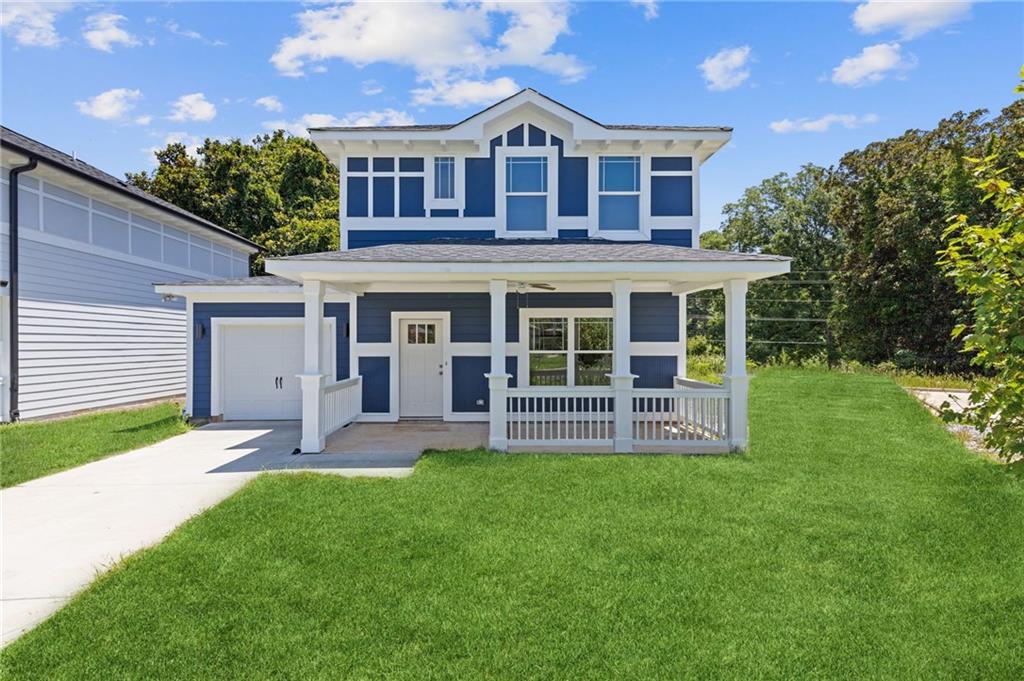 Discover your dream home in the desirable Rosewood at Southbend community! Conveniently located 10 minutes away from Downtown
and Atlanta's International Airport. This beautifully designed new construction boasts 3 spacious bedrooms, 2.5 bathrooms, and a practical
1-car garage. The attached 1-car garage is not only practical but also comes equipped with a built-in electric vehicle charging station for
your convenience. Step inside to find stylish luxury vinyl plank flooring that flows throughout the main living areas. The kitchen features
high-quality Samsung appliances and soft-close cabinets, while large windows flood the space with natural light and a decorative fireplace
adds charm to the living room. On the second floor, the owner's suite impresses with trey ceilings and a well-appointed bathroom that
includes dual shower heads and a built-in bench, along with modern black fixtures that enhance the overall aesthetic of the home. Property
qualifies for GA dream program.