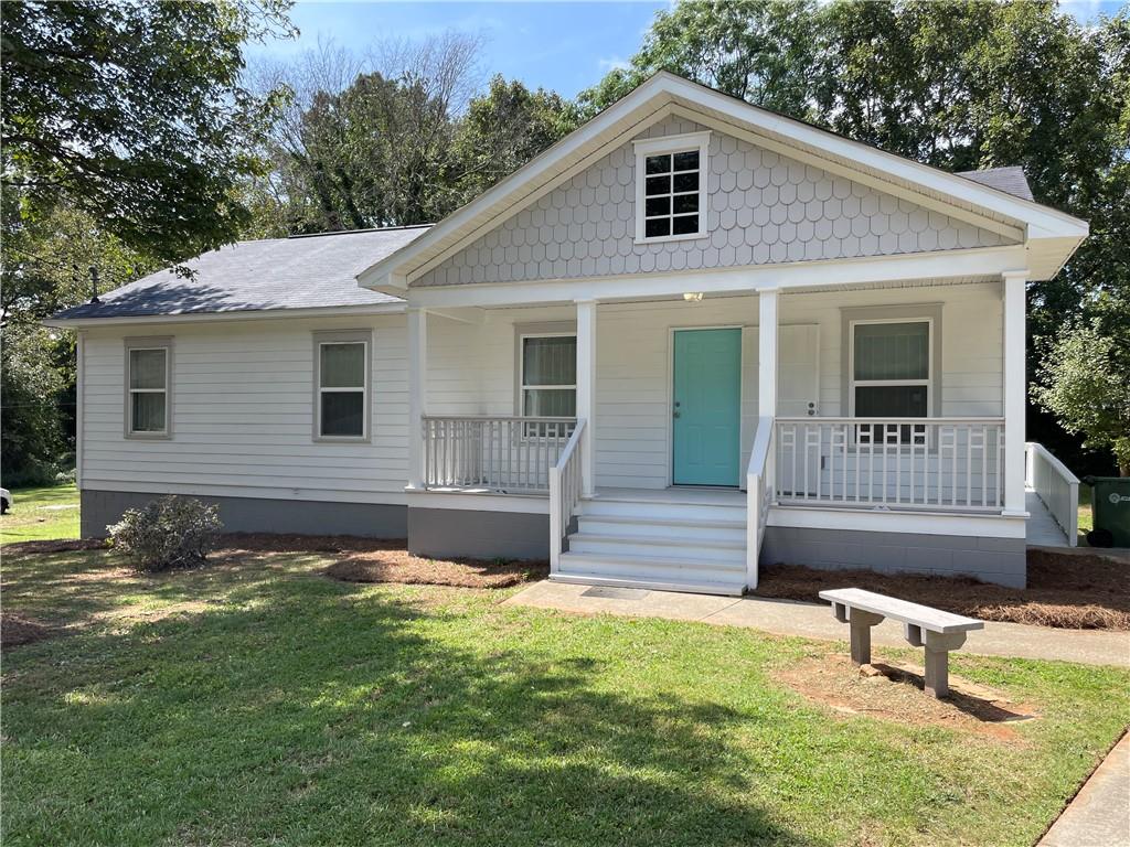 Beautifully renovated bungalow located just 15 minutes from downtown Atlanta. Featuring 4 bedrooms and 2 full
baths, this home has an updated kitchen, new flooring, fresh paint, updated windows and more! The kitchen has all
new appliances, new granite with counter space leading into the dining area – perfect for entertaining. The owner’s
suite features a spacious bedroom with its own full private bath and walk in closet. Beautiful front porch is great for
relaxing with family. The back yard provides great space for entertaining or just relaxing and enjoying nature. This
home is priced to sell!