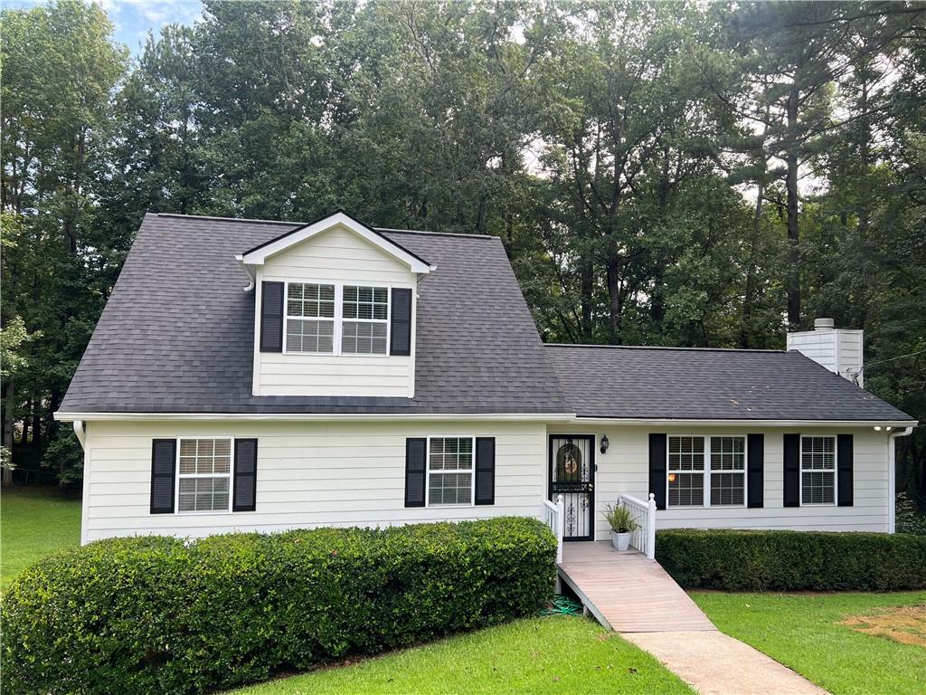 Charming Cape Cod Traditional in CUL-DE-SAC of popular swim/tennis Hanarry Estates West community! HOA is OPTIONAL but swim/tennis/pickleball are available and this home has private access! This RECENTLY UPDATED RANCH home features MASTER ON MAIN with 2 secondary bedrooms on main. Upstairs bonus room can be used as a bedroom. NEW MINI-SPLIT HVAC: 2025! Family Room with stack-stoned fireplace and HARDWOOD FLOORS is open to the Dining Room. FINISHED BASEMENT with full bathroom, 2 additional rooms, family room, and driveway/garage access! Plenty of space for all of your needs. Entertain or convert basement to in-law suite! Lounge and enjoy the huge backyard on your enlarged SCREENED PORCH! Home lies in award-winning Parkview High School cluster! Driveway sloped along the rolling natural landscape of this beautifully established neighborhood. Easy drive to Old Town Lilburn for community events! Bathroom vanities have been updated. ROOF INSTALLED NOV. 2024! WATER HEATER: 2025! SEPTIC SERVICED 2025! New Carpet! New LVP flooring in Basement! NEW PAINT! Owned by One Owner! Your turn to make memories in this wonderful home!