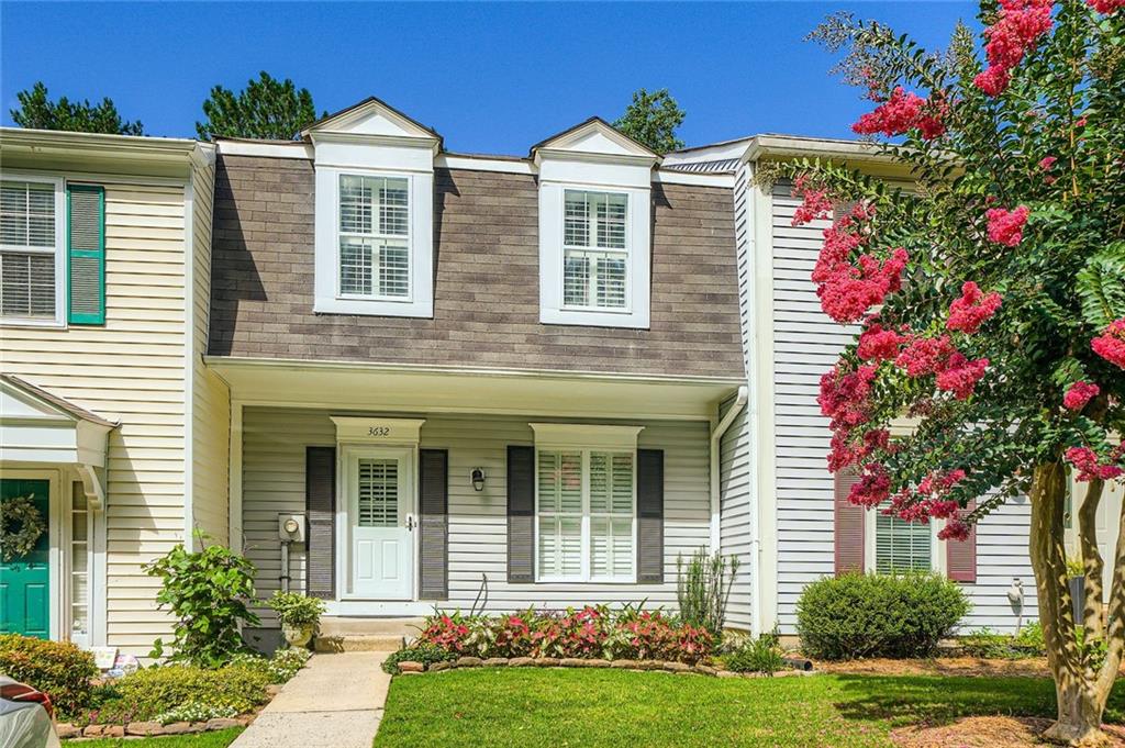 Stylish 2-Bed/2.5-Bath Townhome with Updated Kitchen in Peachtree Corners! Welcome to this beautifully updated 2-bedroom, 2.5-bathroom townhome located in the highly desirable Peachtree Corners, GA. Situated in a quiet, well-maintained community with low HOA fees, this home offers comfort, style, and convenience. The Forum & Town Center are just a short distance and have plenty of shopping and dining options including Trader Joe's! Step into the open-concept main level featuring a spacious living and dining area that flows seamlessly into a fully updated kitchen. Modern finishes and sleek cabinetry make this kitchen a standout-perfect for both everyday living and entertaining. Upstairs, you'll find two generously sized bedrooms, each with its own private en-suite bathroom, ideal for privacy and flexibility. The unfinished basement provides endless potential-great for storage, a home gym, or future expansion. Enjoy easy living in a community that takes care of lawn maintenance so you can focus on what matters most. Conveniently located near top-rated schools, shopping, dining, and parks, this townhome is a perfect fit for first-time buyers, investors, or anyone looking to enjoy the best of Peachtree Corners. Don't miss out-schedule your private tour today!