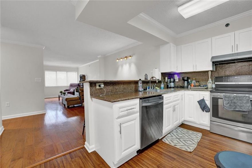 Location! Location! Location! This charming two-bedroom, one-bathroom condo in Sandy Springs offers unparalleled convenience with quick access to I-400 and I-285, plus nearby shopping, dining, parks, MARTA, and more. 
Step inside to discover a well-maintained home featuring an open-concept design, a spacious master bedroom with a walk-in closet, and an updated bath. The condo boasts stainless steel appliances, stone countertops, white cabinets, and modern lighting. The kitchen includes a convenient laundry closet and a full pantry for ample storage.
Enjoy peace of mind with 24-hour concierge service, gated parking, and excellent security. Residents have access to a fitness center, swimming pool, dog park, and grilling area. Water and sewer are included in the HOA fees. This beautiful condo also comes with 2 assigned parking spots, A161 and A310, providing extra security and convience.
Guest parking is available beside the pool.  Please note that parking regulations are strictly enforced
Don't miss this fantastic opportunity to live in one of Sandy Springs' most desirable locations!